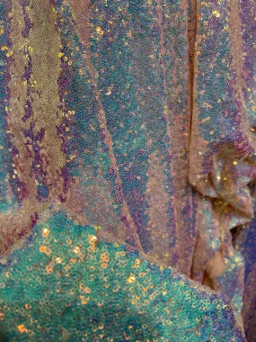 Aqua Iridescent Mini Glitz Sequins on a Blush  4 Way Stretch Mesh-Sold By The Yard.