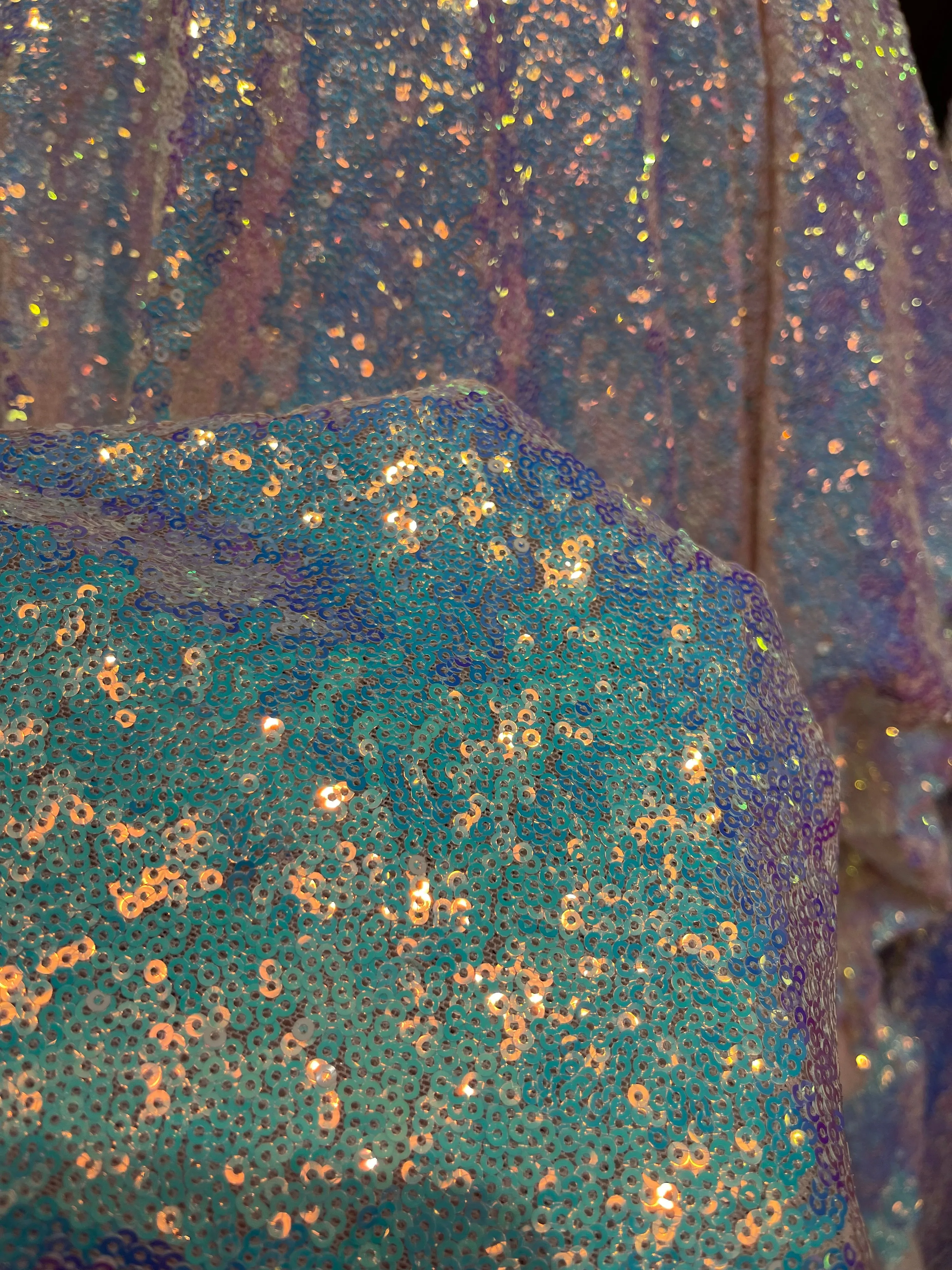 Aqua Iridescent Mini Glitz Sequins on a Blush  4 Way Stretch Mesh-Sold By The Yard.