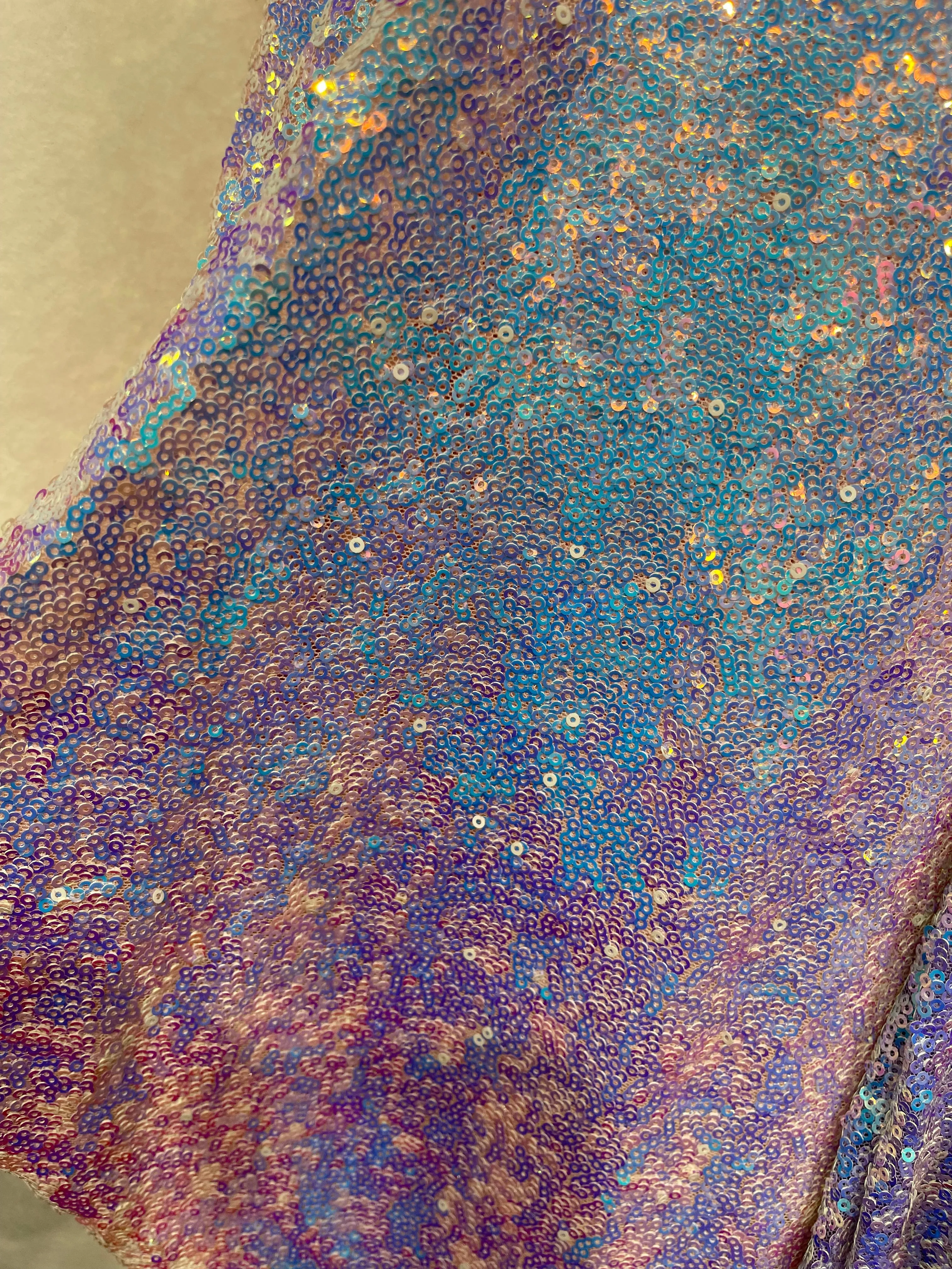 Aqua Iridescent Mini Glitz Sequins on a Blush  4 Way Stretch Mesh-Sold By The Yard.